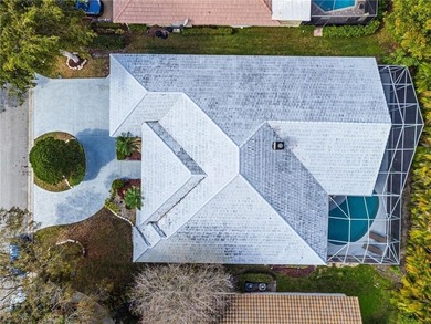 Beautiful 4 bed, 3.5 bath pool home in prestigious guard-gated on TPC Eagle Trace in Florida - for sale on GolfHomes.com, golf home, golf lot