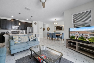 Escape to sun-drenched luxury at 1566 Plunker Drive, a stunning on The Oasis Club at Champions Gate in Florida - for sale on GolfHomes.com, golf home, golf lot