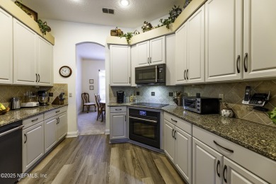 'This meticulously maintained home will Knock Your Socks Off! on Windsor Parke Golf Club in Florida - for sale on GolfHomes.com, golf home, golf lot