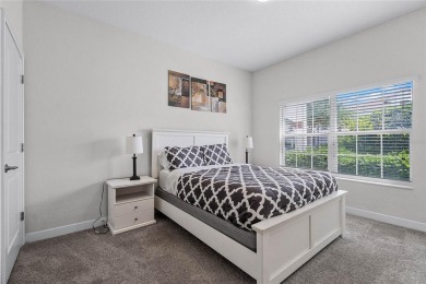 Escape to sun-drenched luxury at 1566 Plunker Drive, a stunning on The Oasis Club at Champions Gate in Florida - for sale on GolfHomes.com, golf home, golf lot