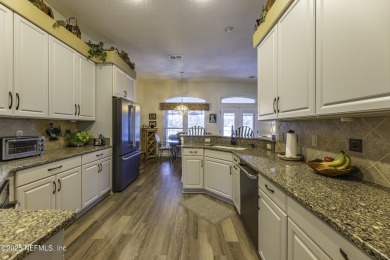 'This meticulously maintained home will Knock Your Socks Off! on Windsor Parke Golf Club in Florida - for sale on GolfHomes.com, golf home, golf lot