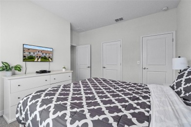 Escape to sun-drenched luxury at 1566 Plunker Drive, a stunning on The Oasis Club at Champions Gate in Florida - for sale on GolfHomes.com, golf home, golf lot