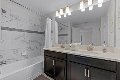Escape to sun-drenched luxury at 1566 Plunker Drive, a stunning on The Oasis Club at Champions Gate in Florida - for sale on GolfHomes.com, golf home, golf lot