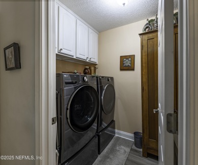 'This meticulously maintained home will Knock Your Socks Off! on Windsor Parke Golf Club in Florida - for sale on GolfHomes.com, golf home, golf lot