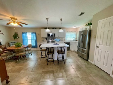 Check this out!! This home has been meticulously kept with on Water Oak Country Club Estates in Florida - for sale on GolfHomes.com, golf home, golf lot