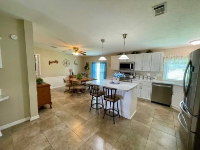 Check this out!! This home has been meticulously kept with on Water Oak Country Club Estates in Florida - for sale on GolfHomes.com, golf home, golf lot