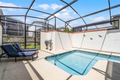 Escape to sun-drenched luxury at 1566 Plunker Drive, a stunning on The Oasis Club at Champions Gate in Florida - for sale on GolfHomes.com, golf home, golf lot