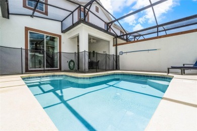 Escape to sun-drenched luxury at 1566 Plunker Drive, a stunning on The Oasis Club at Champions Gate in Florida - for sale on GolfHomes.com, golf home, golf lot