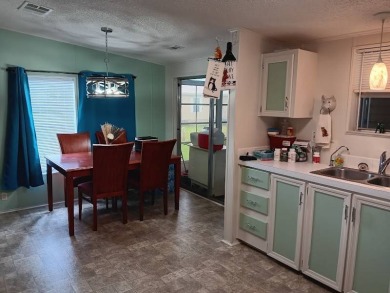 NEW LISTING - Priced @ $74,900.    Very well-maintained 2 Bed 2 on Four Lakes Golf Club in Florida - for sale on GolfHomes.com, golf home, golf lot