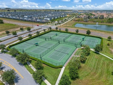 Escape to sun-drenched luxury at 1566 Plunker Drive, a stunning on The Oasis Club at Champions Gate in Florida - for sale on GolfHomes.com, golf home, golf lot