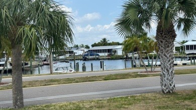 An absolute boater's dream right off the Calossahatchee River on Riverbend Golf and Country Club in Florida - for sale on GolfHomes.com, golf home, golf lot