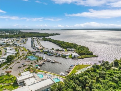 An absolute boater's dream right off the Calossahatchee River on Riverbend Golf and Country Club in Florida - for sale on GolfHomes.com, golf home, golf lot