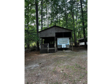 Nice size lot with parking area. 1995 Camper has stick built on River Ridge Golf Club in Virginia - for sale on GolfHomes.com, golf home, golf lot