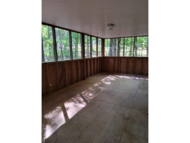 Nice size lot with parking area. 1995 Camper has stick built on River Ridge Golf Club in Virginia - for sale on GolfHomes.com, golf home, golf lot