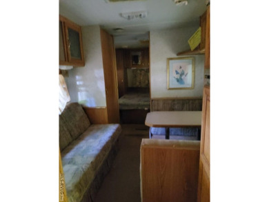 Nice size lot with parking area. 1995 Camper has stick built on River Ridge Golf Club in Virginia - for sale on GolfHomes.com, golf home, golf lot