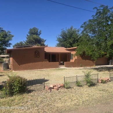 This charming Santa Fe style home is waiting for you to come and on BC Ranch Golf Club in Arizona - for sale on GolfHomes.com, golf home, golf lot