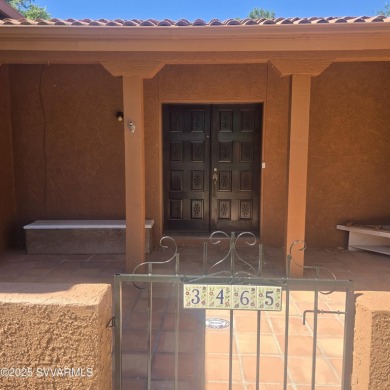 This charming Santa Fe style home is waiting for you to come and on BC Ranch Golf Club in Arizona - for sale on GolfHomes.com, golf home, golf lot