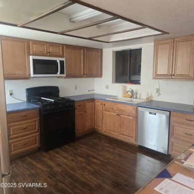 This charming Santa Fe style home is waiting for you to come and on BC Ranch Golf Club in Arizona - for sale on GolfHomes.com, golf home, golf lot