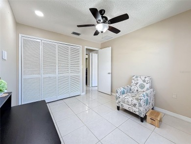 Welcome to this spacious 4-bedroom, 2-bathroom corner-unit villa on East Lake Woodlands Country Club in Florida - for sale on GolfHomes.com, golf home, golf lot