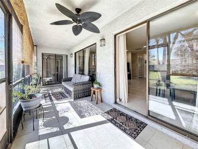 Welcome to this spacious 4-bedroom, 2-bathroom corner-unit villa on East Lake Woodlands Country Club in Florida - for sale on GolfHomes.com, golf home, golf lot