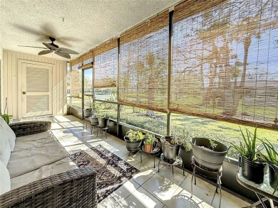 Welcome to this spacious 4-bedroom, 2-bathroom corner-unit villa on East Lake Woodlands Country Club in Florida - for sale on GolfHomes.com, golf home, golf lot