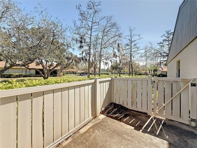 Welcome to this spacious 4-bedroom, 2-bathroom corner-unit villa on East Lake Woodlands Country Club in Florida - for sale on GolfHomes.com, golf home, golf lot