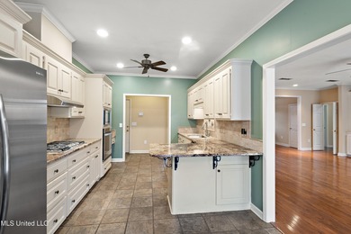 Experience upscale living at this beautiful home located in the on Colonial Country Club Deerfield in Mississippi - for sale on GolfHomes.com, golf home, golf lot