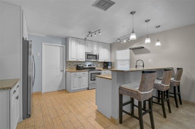 Welcome to Jacaranda West! This updated 3-bedroom, 2-bath pool on Jacaranda West Country Club in Florida - for sale on GolfHomes.com, golf home, golf lot