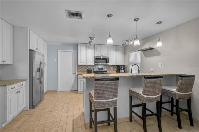 Welcome to Jacaranda West! This updated 3-bedroom, 2-bath pool on Jacaranda West Country Club in Florida - for sale on GolfHomes.com, golf home, golf lot