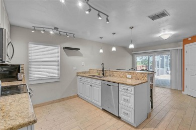 Welcome to Jacaranda West! This updated 3-bedroom, 2-bath pool on Jacaranda West Country Club in Florida - for sale on GolfHomes.com, golf home, golf lot