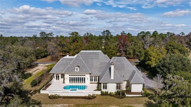 Indulge in luxury living from this impeccable new construction on Golden Ocala Golf and Equestrian Club in Florida - for sale on GolfHomes.com, golf home, golf lot