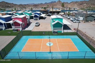 Set along the scenic Colorado River, this bungalow at Roadrunner on Emerald Canyon Golf Course in Arizona - for sale on GolfHomes.com, golf home, golf lot