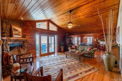 LAKEFRONT! Custom built in 2005, this beautiful log home is your on  in Arkansas - for sale on GolfHomes.com, golf home, golf lot