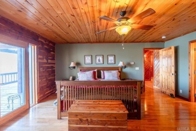 LAKEFRONT! Custom built in 2005, this beautiful log home is your on  in Arkansas - for sale on GolfHomes.com, golf home, golf lot