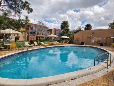 Spacious 2-bedroom, 2-bathroom second-floor condo located in a on Colony West Country Club in Florida - for sale on GolfHomes.com, golf home, golf lot