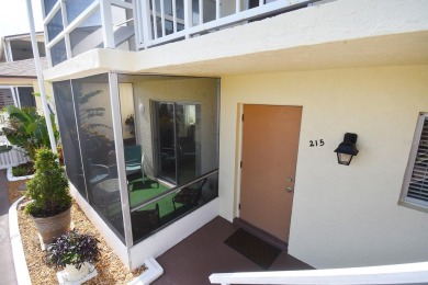 Rarely available ground floor end unit. Easy access to Sharkey's on Lake Venice Golf Club in Florida - for sale on GolfHomes.com, golf home, golf lot