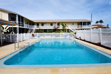 Rarely available ground floor end unit. Easy access to Sharkey's on Lake Venice Golf Club in Florida - for sale on GolfHomes.com, golf home, golf lot
