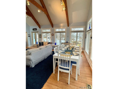 Discover unparalleled lakefront living in the coveted Tanglewood on Tanglewood Shores Golf Club in Virginia - for sale on GolfHomes.com, golf home, golf lot
