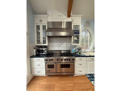 Discover unparalleled lakefront living in the coveted Tanglewood on Tanglewood Shores Golf Club in Virginia - for sale on GolfHomes.com, golf home, golf lot