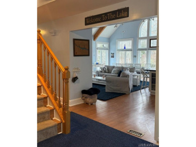 Discover unparalleled lakefront living in the coveted Tanglewood on Tanglewood Shores Golf Club in Virginia - for sale on GolfHomes.com, golf home, golf lot