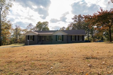 This 3 bed 2 1/2 bath home is sitting on 5.1 acres on the eagle on The Course At Eagle Mountain in Arkansas - for sale on GolfHomes.com, golf home, golf lot