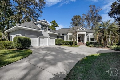 Enjoy panoramic golf course and lagoon views from this beautiful on The Landings Club - Oakridge in Georgia - for sale on GolfHomes.com, golf home, golf lot