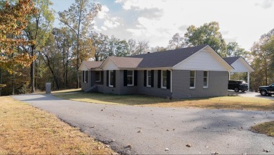 This 3 bed 2 1/2 bath home is sitting on 5.1 acres on the eagle on The Course At Eagle Mountain in Arkansas - for sale on GolfHomes.com, golf home, golf lot