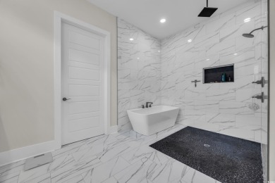 Discover unparalleled luxury at 1024 Pochard Dr, a truly on Wild Wing Plantation in South Carolina - for sale on GolfHomes.com, golf home, golf lot