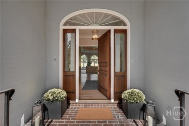 Enjoy panoramic golf course and lagoon views from this beautiful on The Landings Club - Oakridge in Georgia - for sale on GolfHomes.com, golf home, golf lot