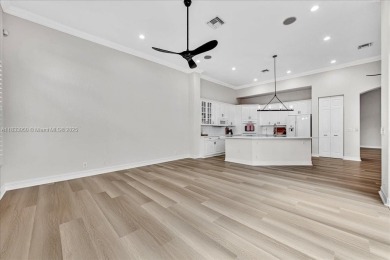 UPDATED AND MOVE-IN READY! This immaculate 4BD/3BA one-story on Heron Bay Golf Club in Florida - for sale on GolfHomes.com, golf home, golf lot