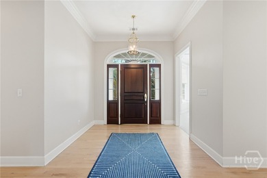 Enjoy panoramic golf course and lagoon views from this beautiful on The Landings Club - Oakridge in Georgia - for sale on GolfHomes.com, golf home, golf lot