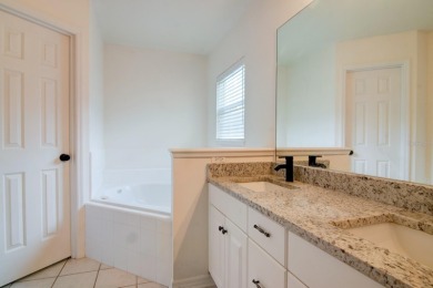 Welcome to this beautifully updated 4-bedroom, 2.5-bathroom home on Haile Plantation Golf and Country Club in Florida - for sale on GolfHomes.com, golf home, golf lot