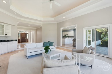 Enjoy panoramic golf course and lagoon views from this beautiful on The Landings Club - Oakridge in Georgia - for sale on GolfHomes.com, golf home, golf lot