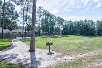 Welcome to this beautifully updated 4-bedroom, 2.5-bathroom home on Haile Plantation Golf and Country Club in Florida - for sale on GolfHomes.com, golf home, golf lot